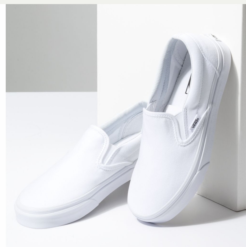 Women's size 12 true white Van's slip ons